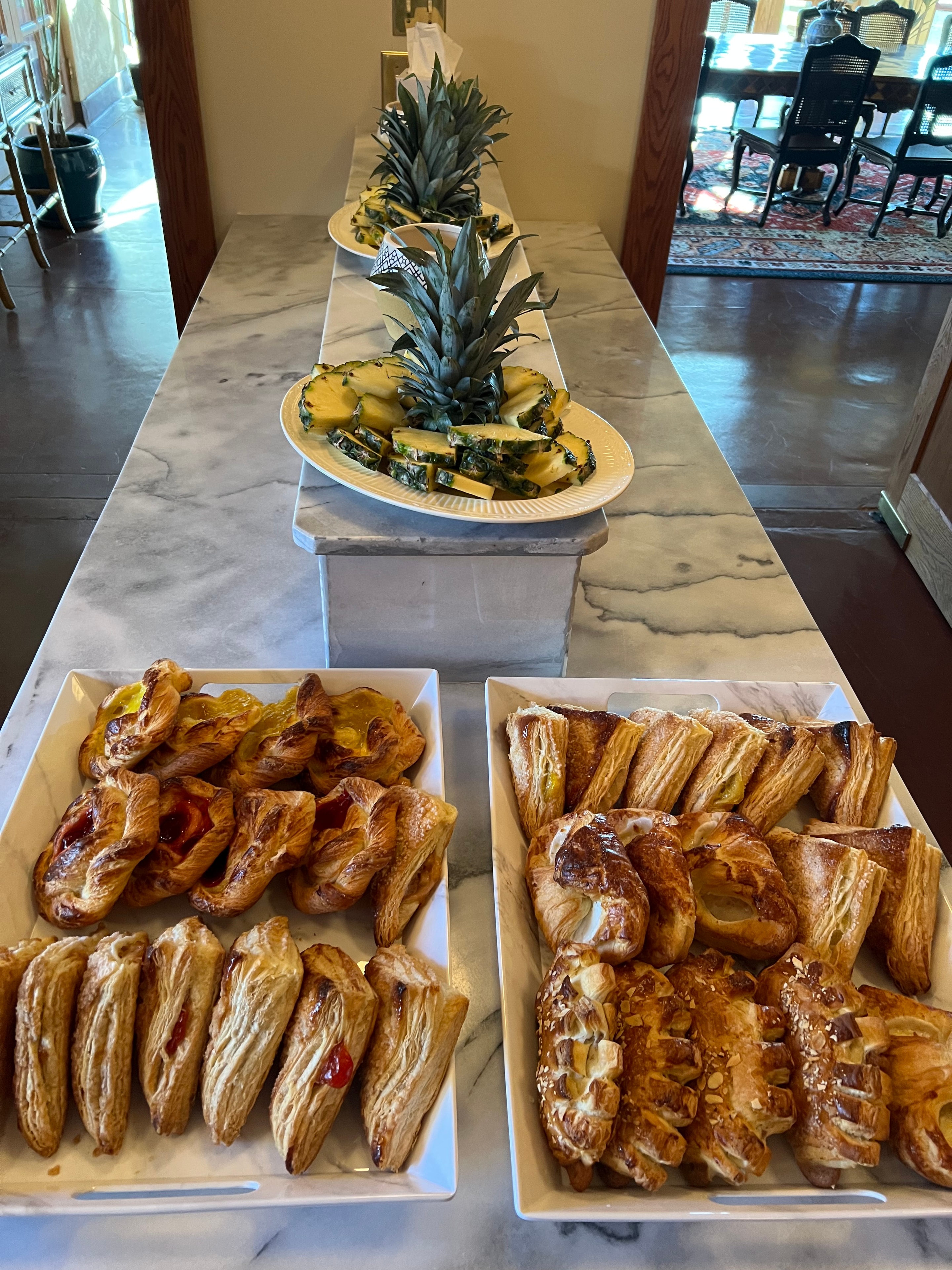 Pastries and pineapple display buffet table